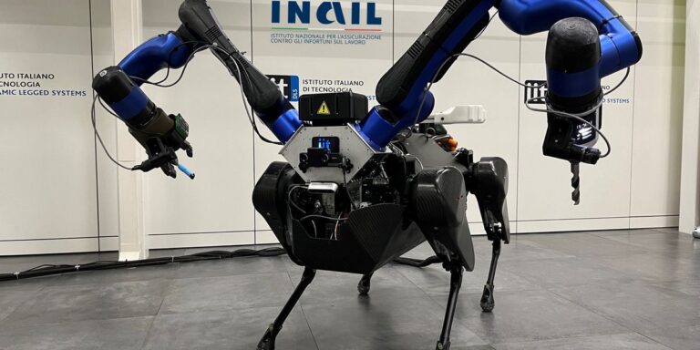 a-large-quadrupedal-robot-with-two-large-blue-and-black-arms-attached-to-its-head-with-tools-on-the.jpeg